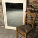 Louis XV-style mirror in wood and white stucctuc and patinated beige