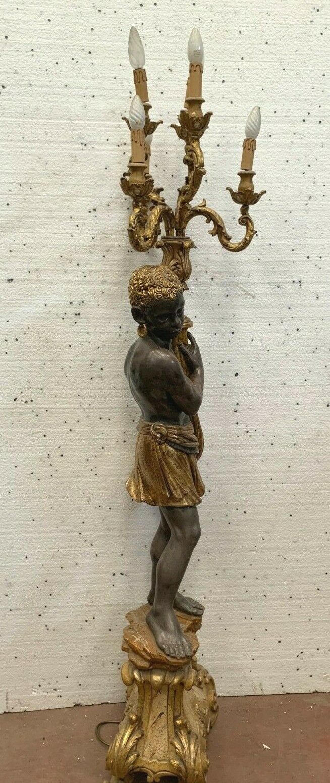 Torchère decoration of a nubian in wood and gilded stucco XX century