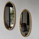 Pair of oval mirrors 1900 gilded stucco
