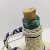 Glass bottle and scoubidou