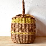 Vintage wicker basket crossed with a yellow scoubidou