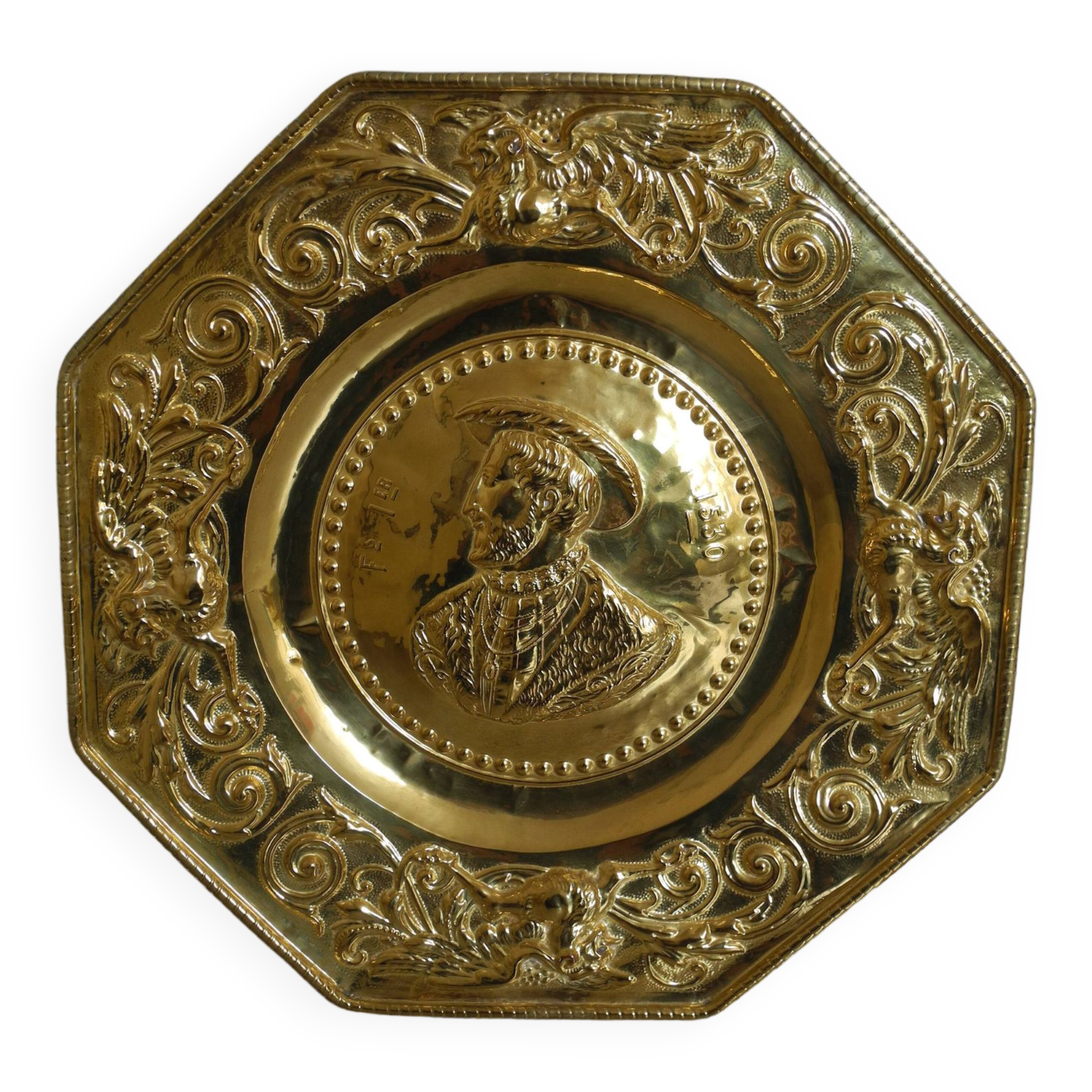 Offering dish in embossed brass by François I