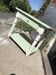 Rustic wooden dining table painted white and pale green, with a central drawer, 1950s.