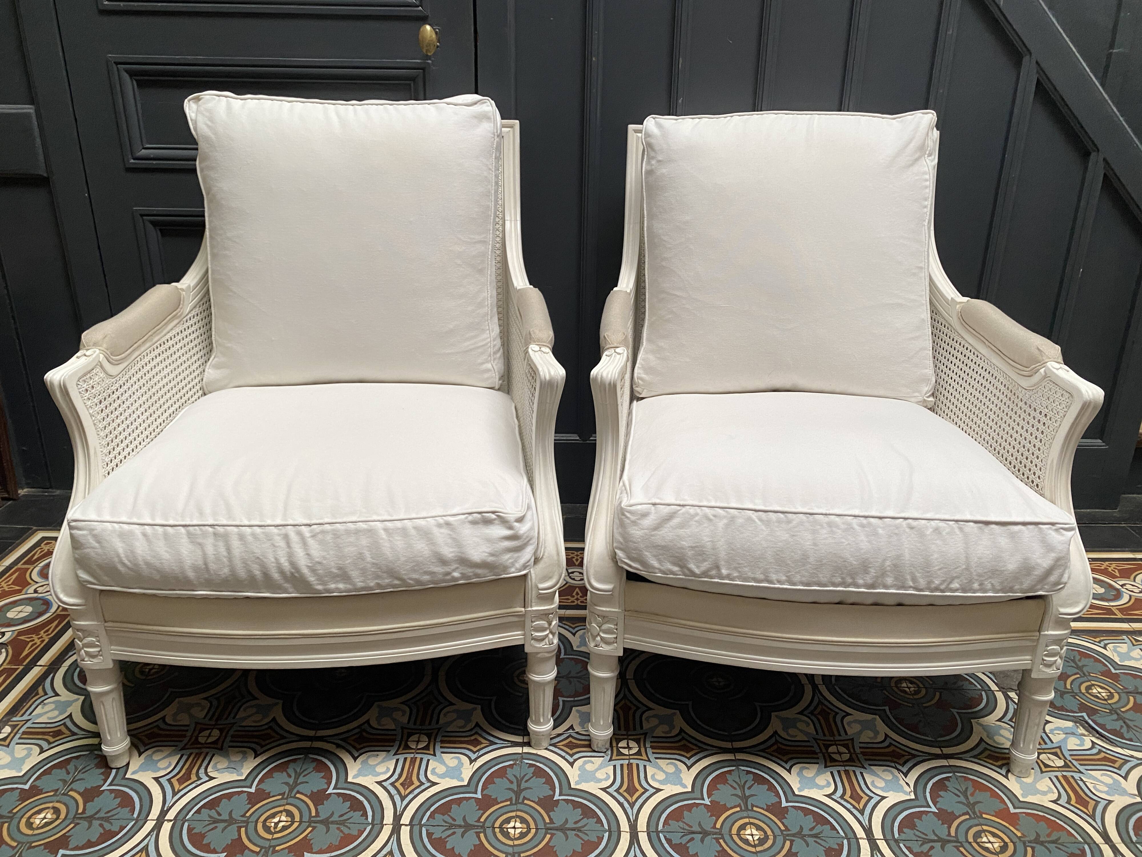 Pair of Louis XVI style caned Bergère armchairs