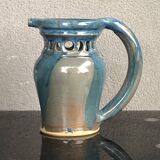 Stoneware pitcher.