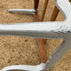 Louis XV style walnut table with a natural wood top.