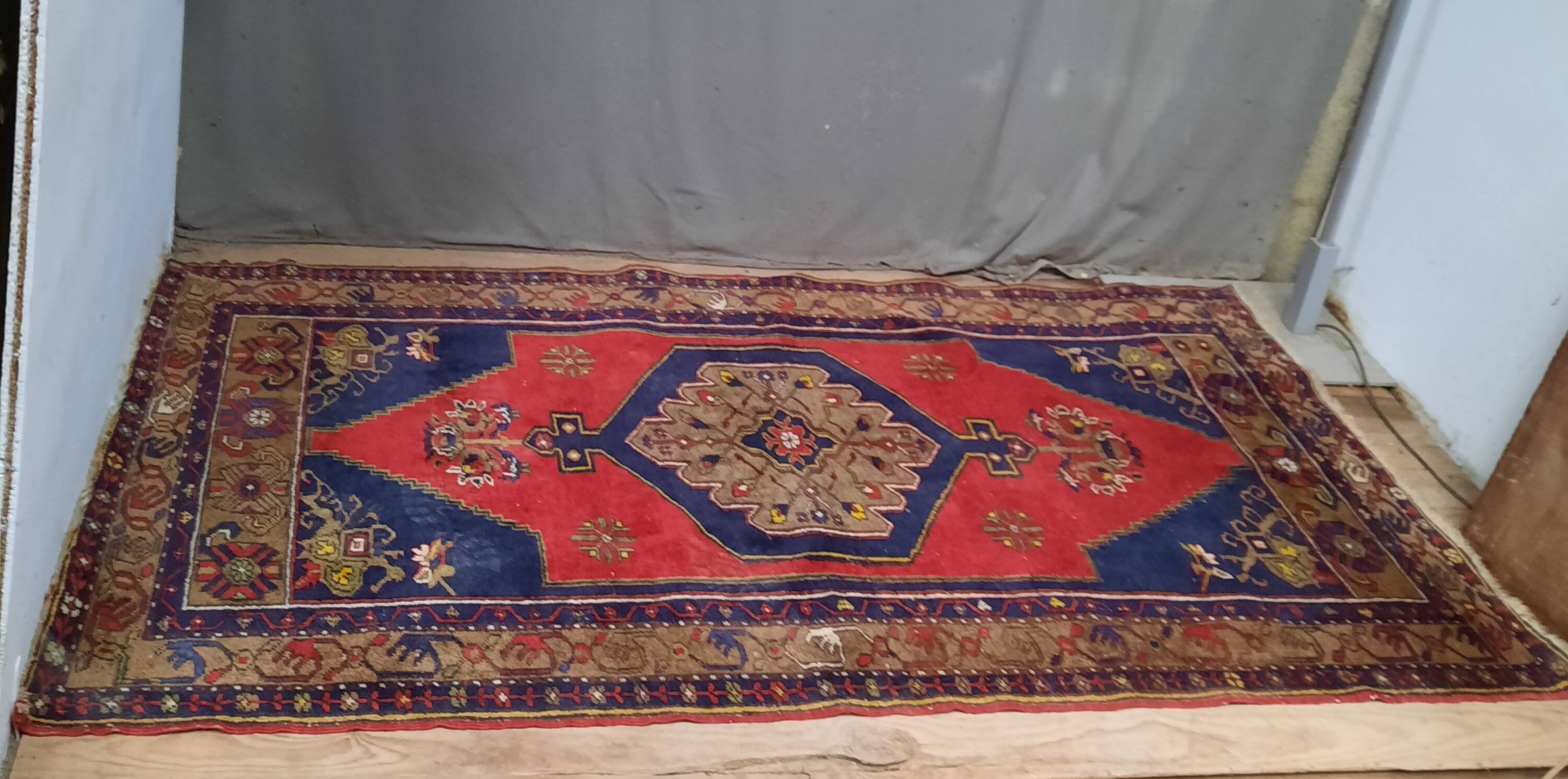 Handmade blue and red rug