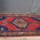 Tapis fait main bleu et rouge