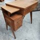 Vintage 1950s side desk with tapered legs.