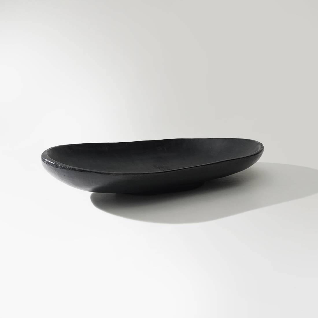 Organic shaped black wooden bowl, 1960s