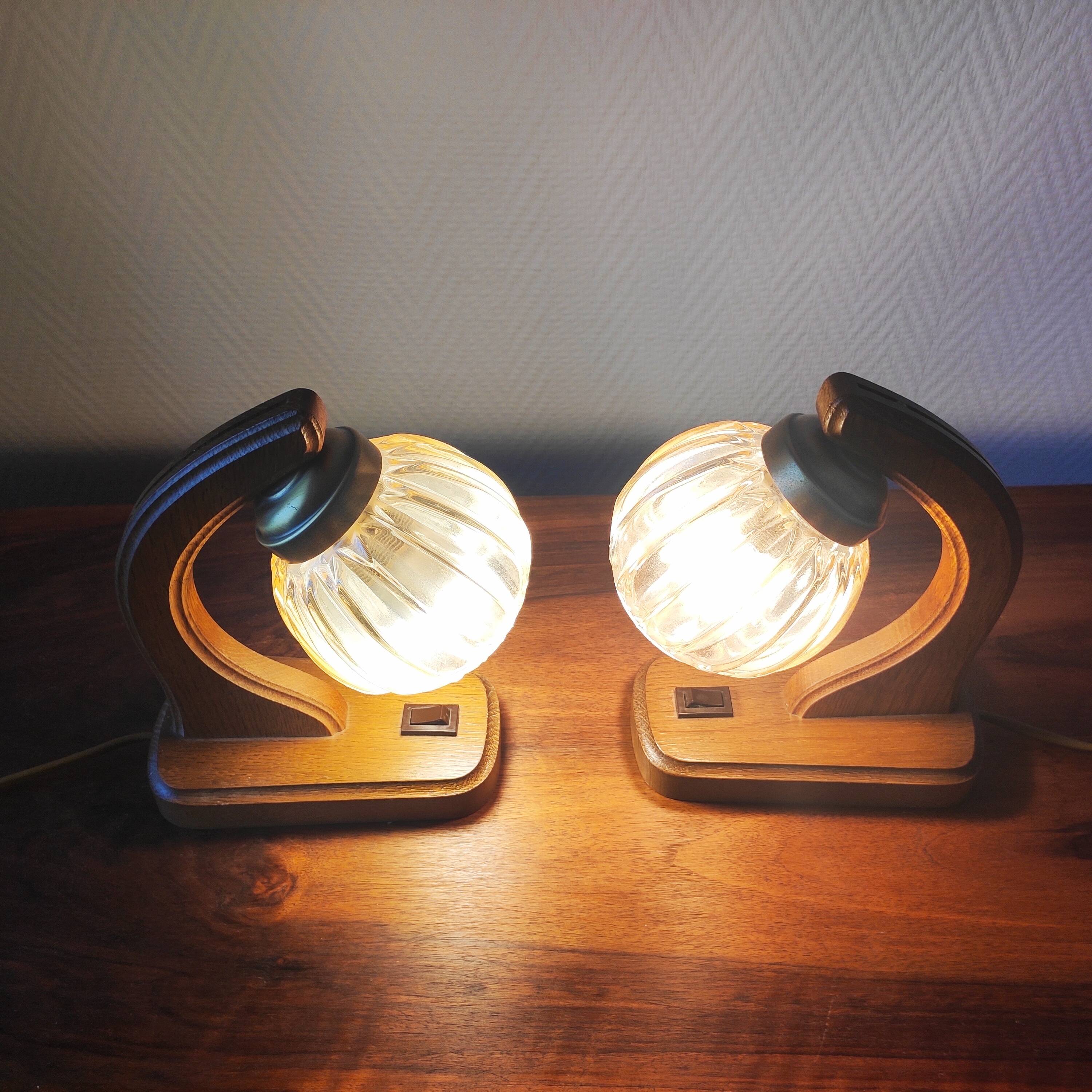 Pair of vintage 1970s mid-century Scandinavian lamps with amber globe.