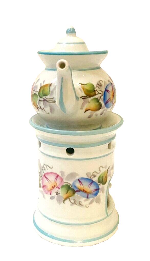 Polychrome porcelain tea pot with 20th century floral decoration