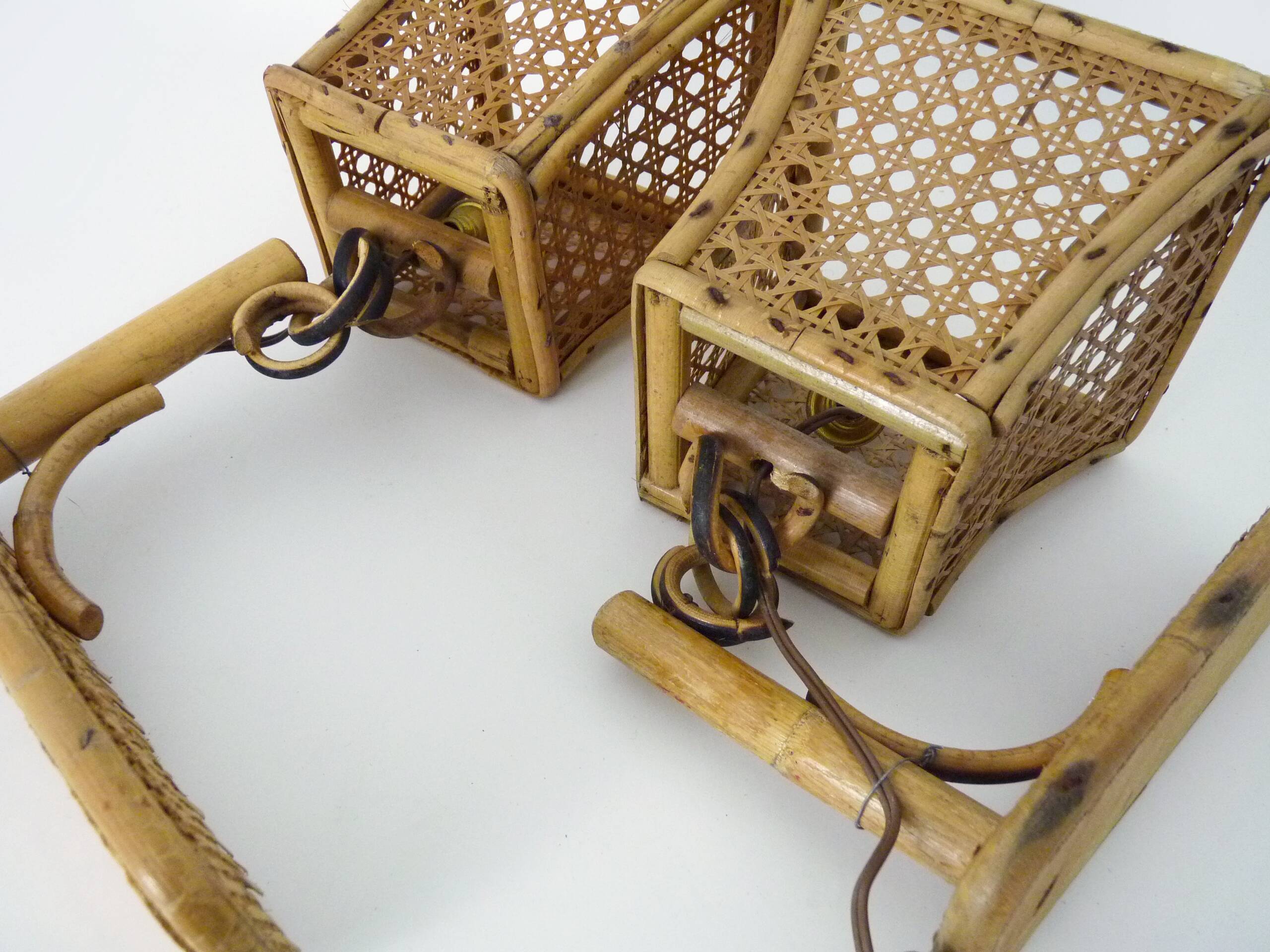 Pair of rattan and cane lantern wall lights. 1950s-1960s