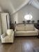 The complete Burov living room set: 3-seater sofa and armchair in ivory leather