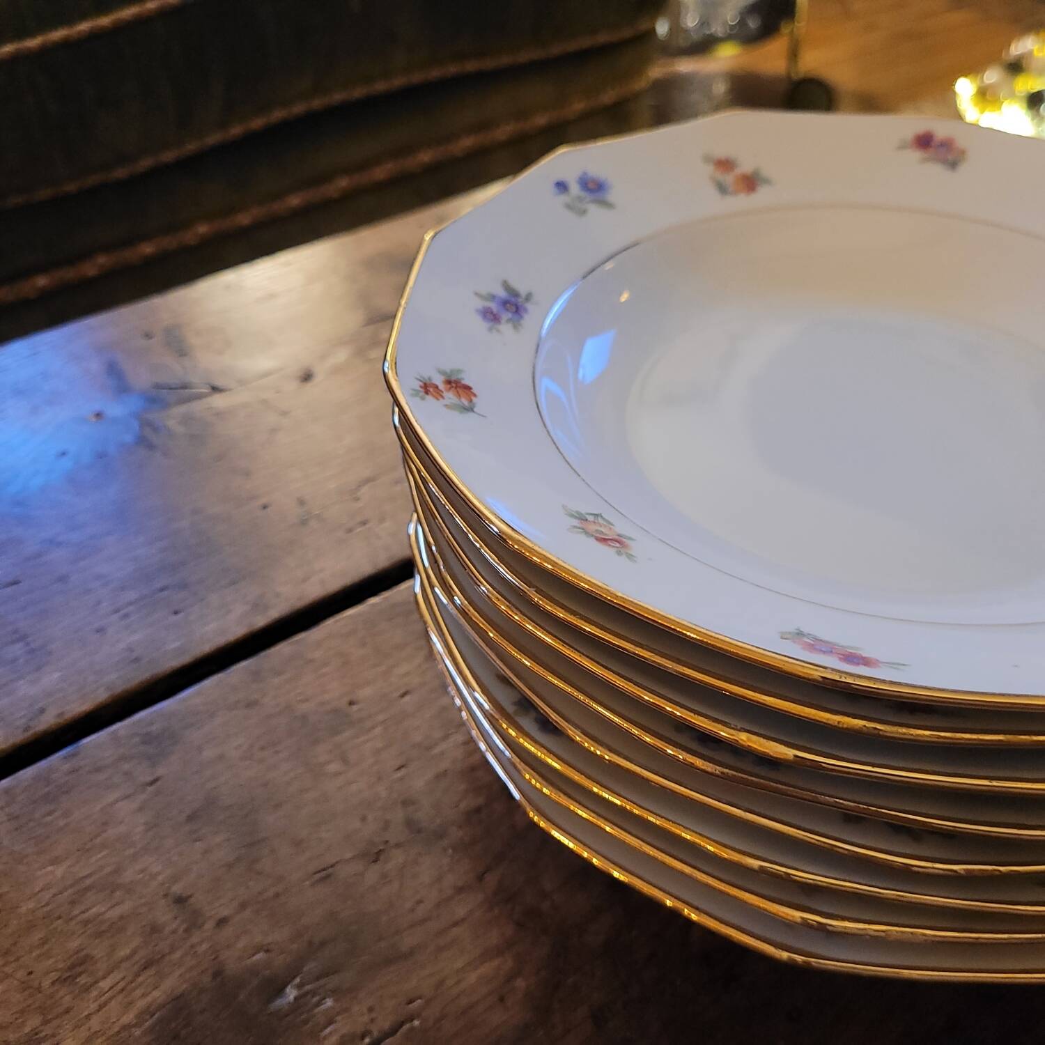 Porcelain soup plates - Decorated with small flowers and a gold rim