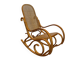 Antique rocking chair in curved wood and caning.