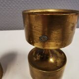 Three beautiful candle holders in solid brass, for block candles.