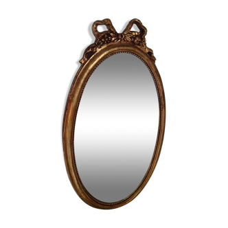 Miroir médaillon en bois doré - 43x24cm