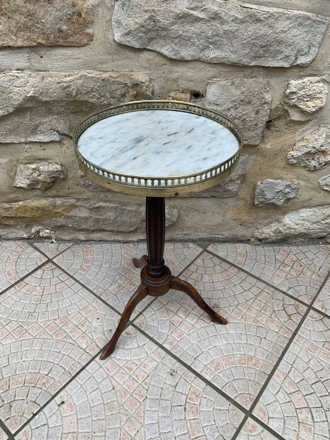 Tripod marble pedestal table