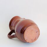 Vintage pitcher in glazed earth