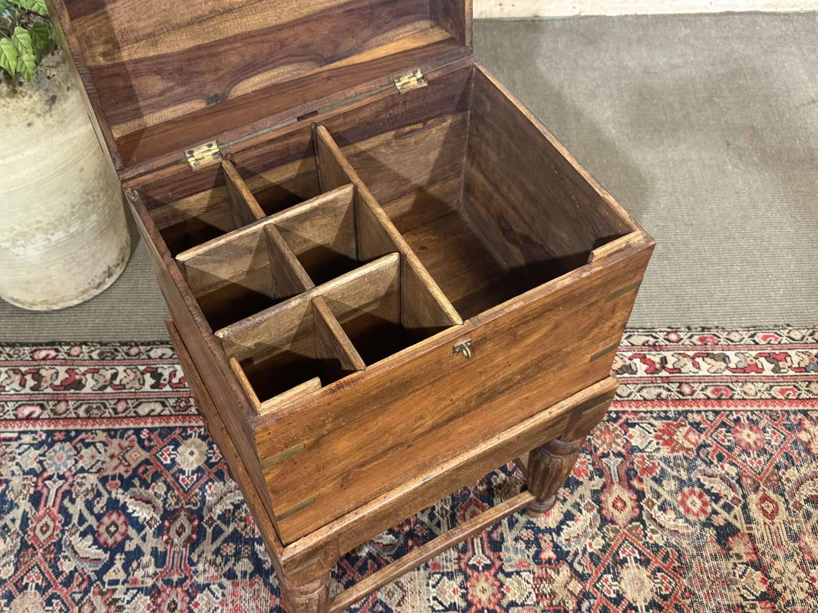 Teak bottle cabinet on legs in marine style