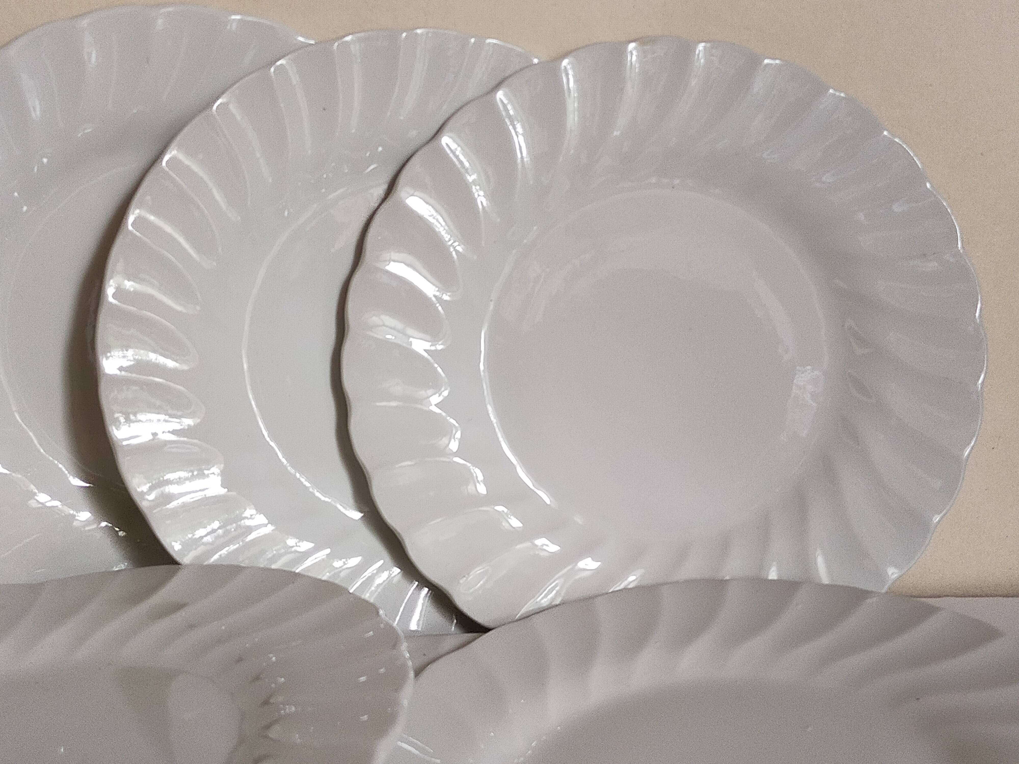 Nine fine English porcelain sweet plates