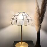 Table lamp with a lampshade with mother-of-pearl set with checkerboard brass and a gilded foot