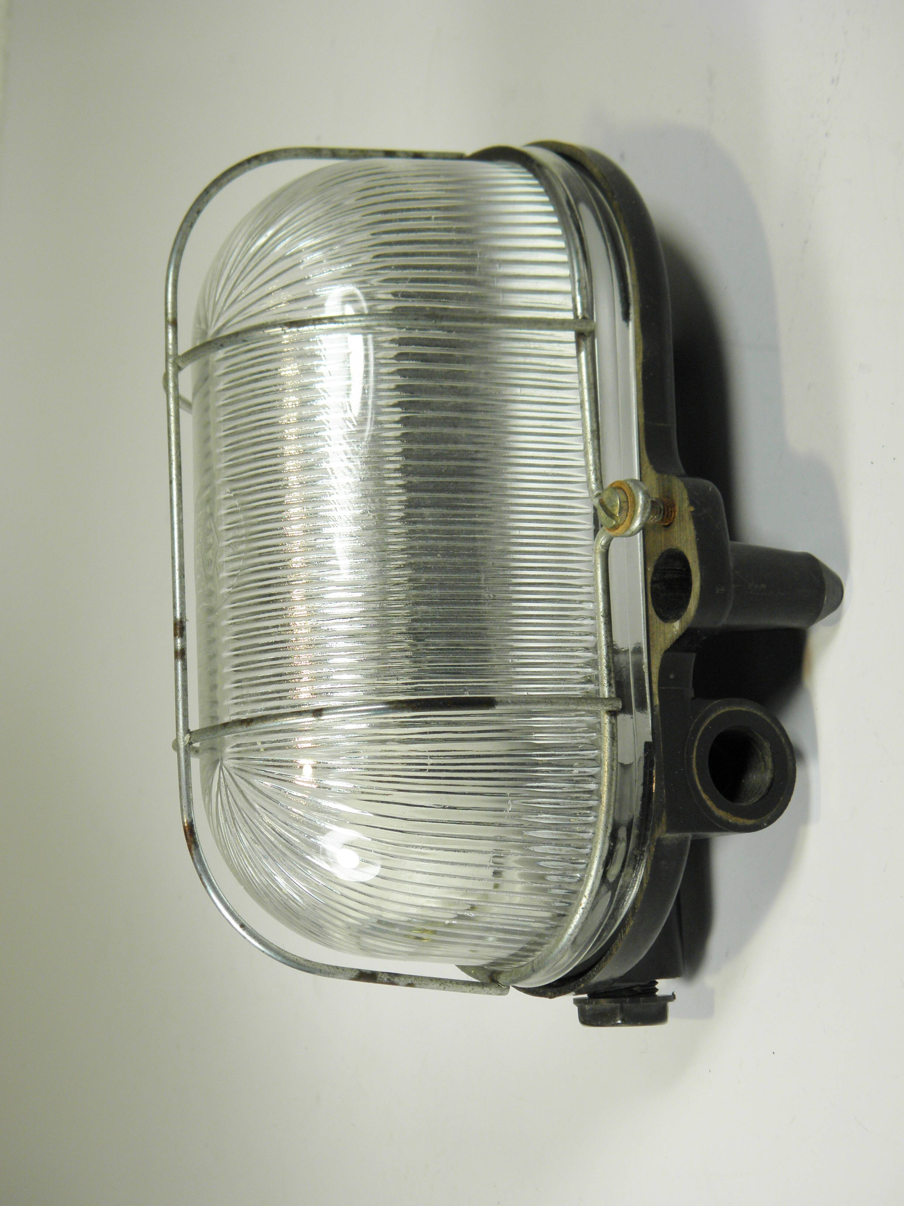 Glass and Bakelite wall light from the 1950s.
