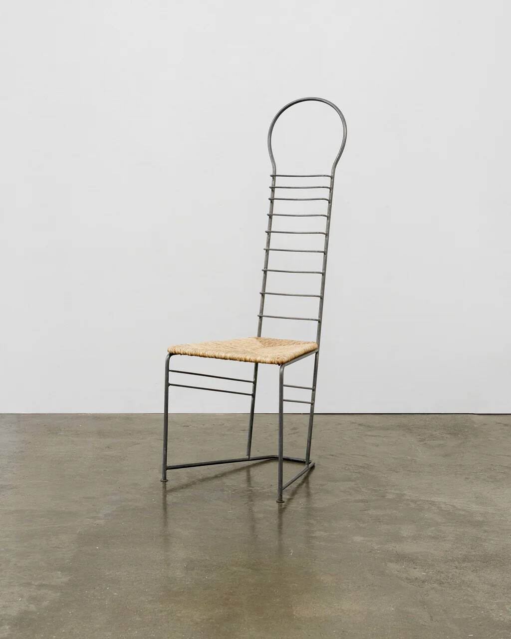 Chaise sculpturale vintage en acier et paille