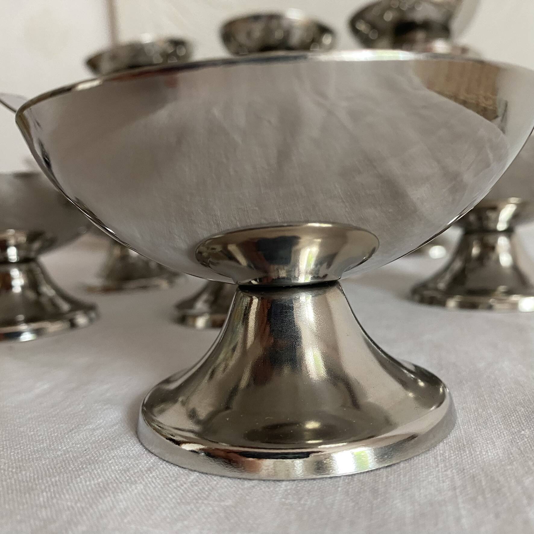 Stainless steel ice cream cups and spoons, 1960s-70s, original boxes.