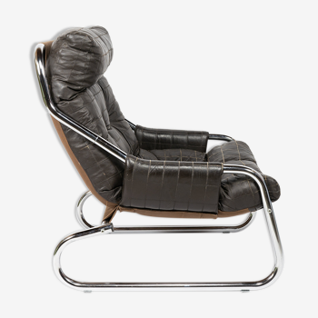 Vintage relax chair in leather and chrome