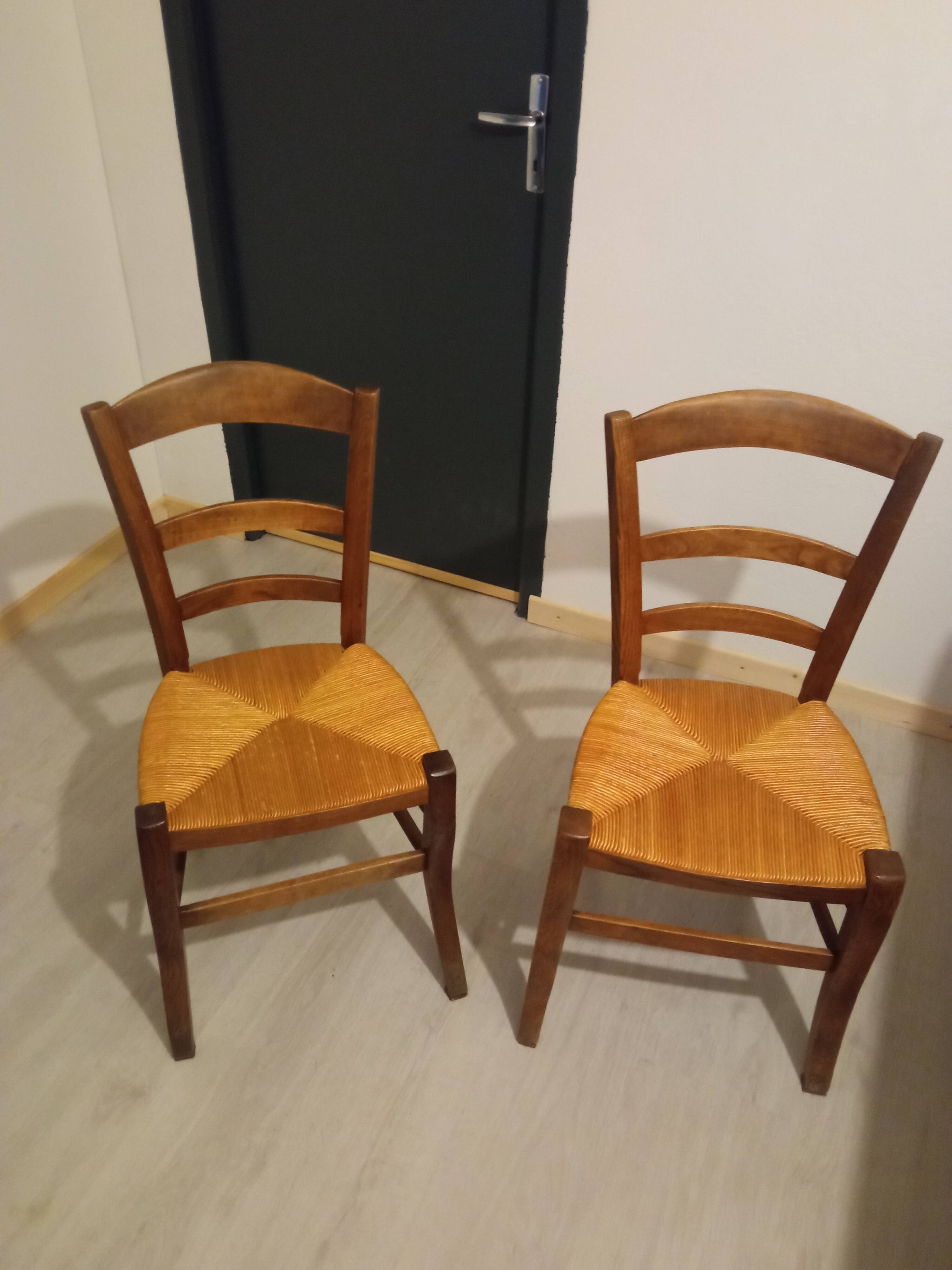 Pair of vintage wooden and woven straw chairs