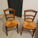 Pair of vintage wooden and woven straw chairs