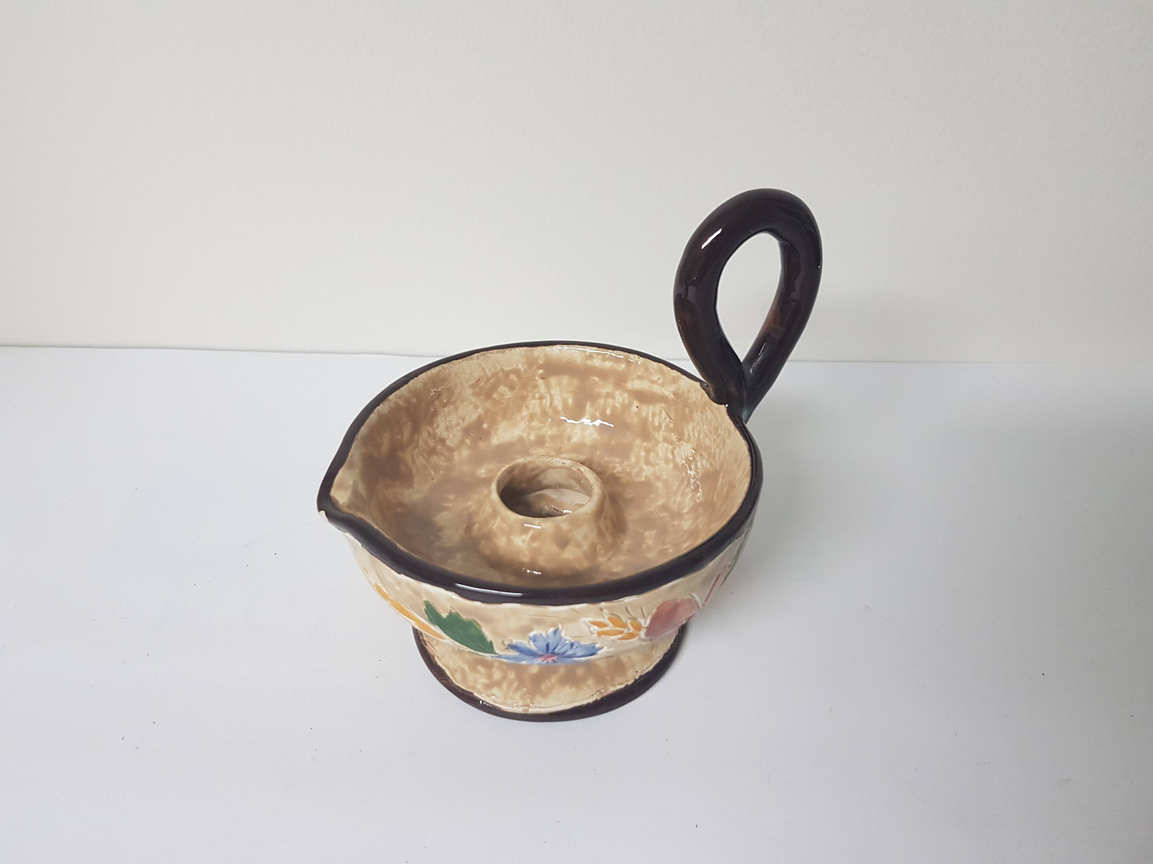 Floral motif ceramic candle holder signed J Massier Vallauris