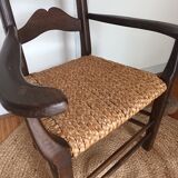 Brutalist armchair in woven straw