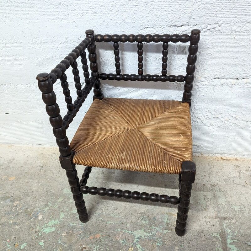 Turned wooden corner chair