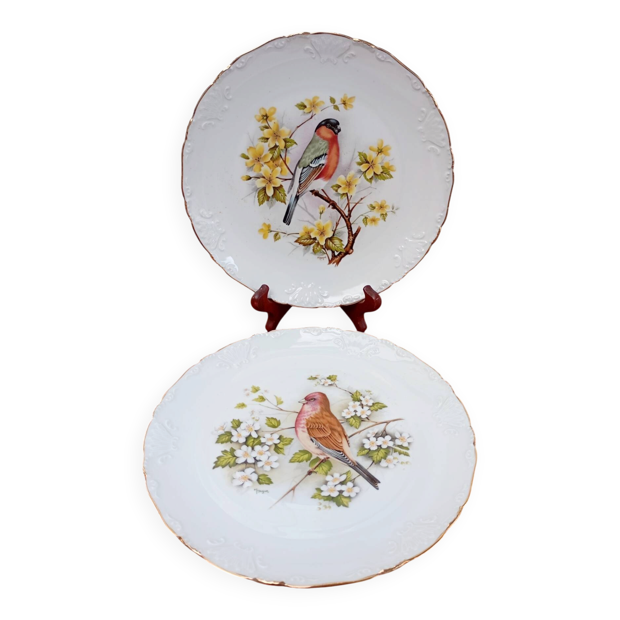 Two Limoges porcelain plates signed M. Hague.