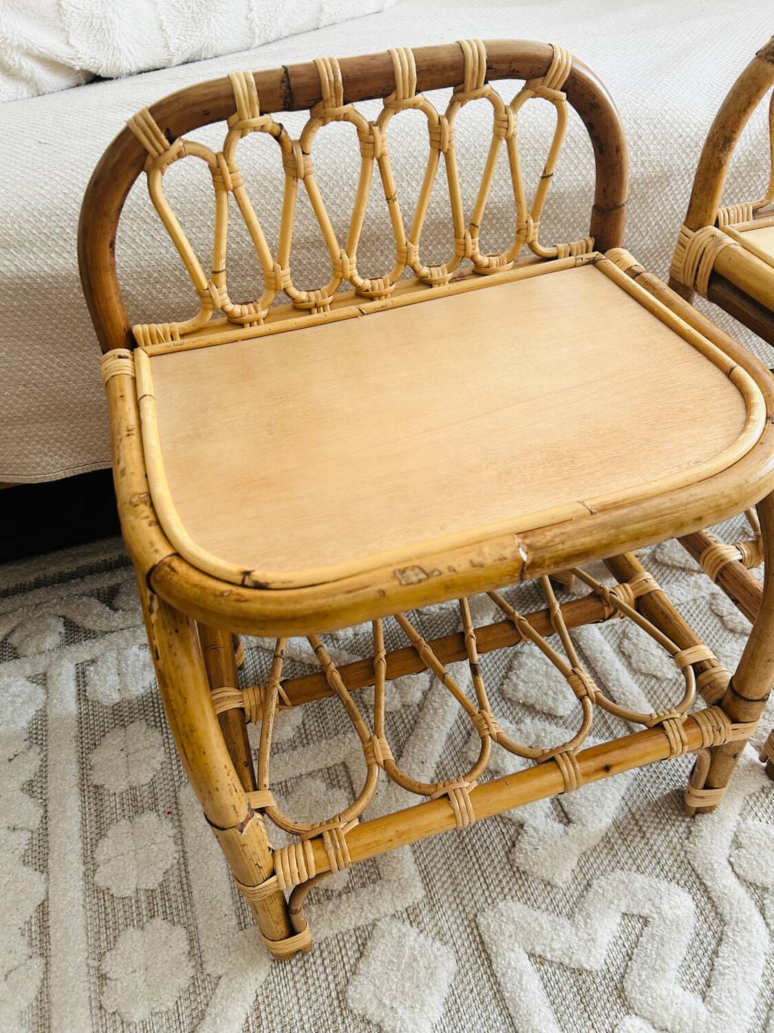 Two rattan bedside tables