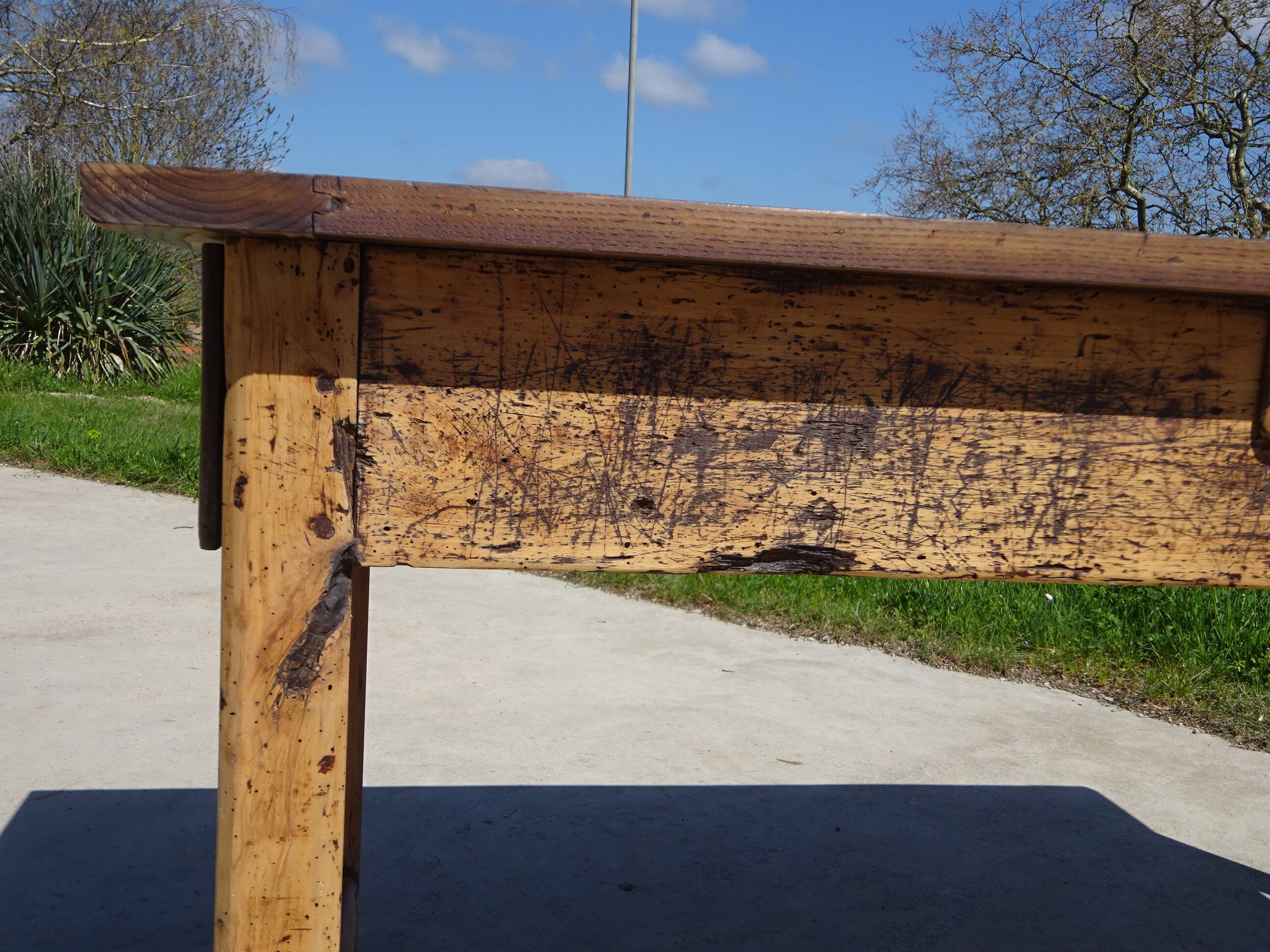 Old farmhouse table made entirely of restored solid oak.