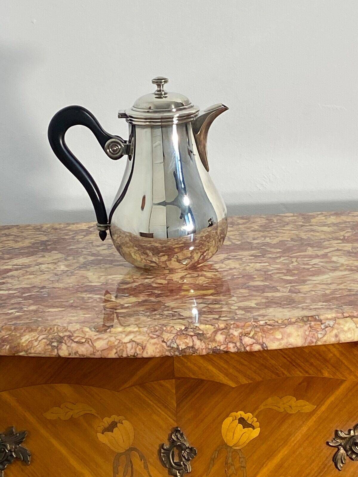 Saint Hilaire teapot in silver-plated metal, with a blackened handle.