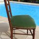 1 solid wood chair with green velvet top and nails