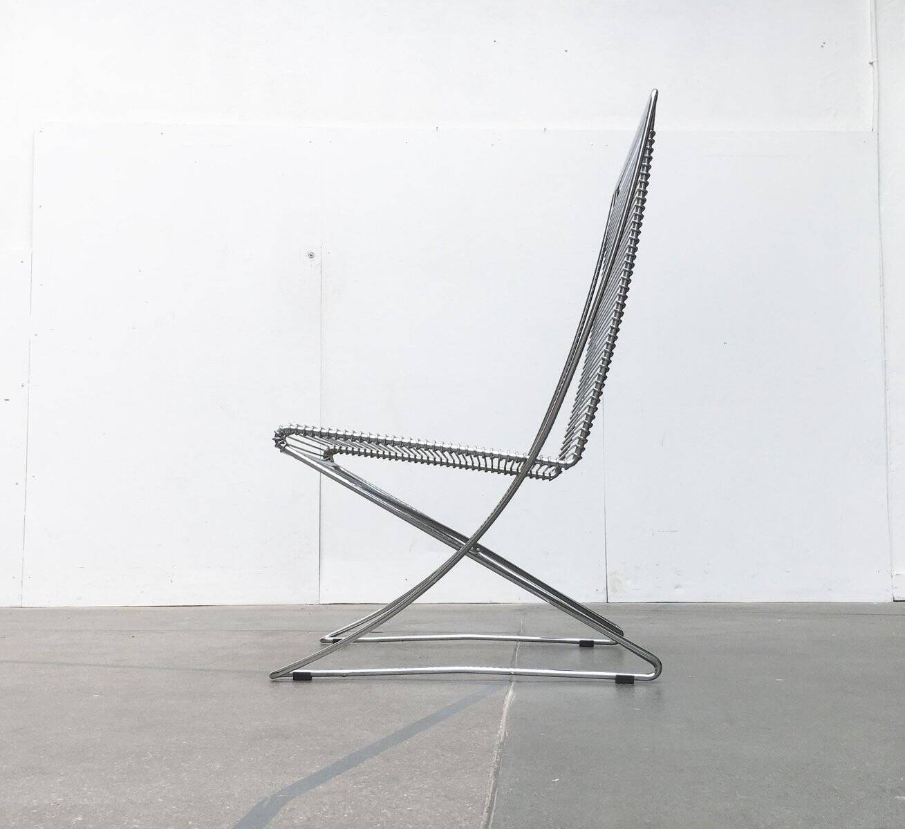 Vintage German Kreuzschwinger lounge chair by Till Behrens for Meyer Stahlmöbel, 1980s.