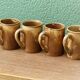 Lot de 4 mugs en grés, signés Jean Gaubier