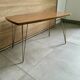 Table basse vintage 1960 Formica teck et pieds laiton