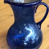Pitcher made of blown and bubbled glass
