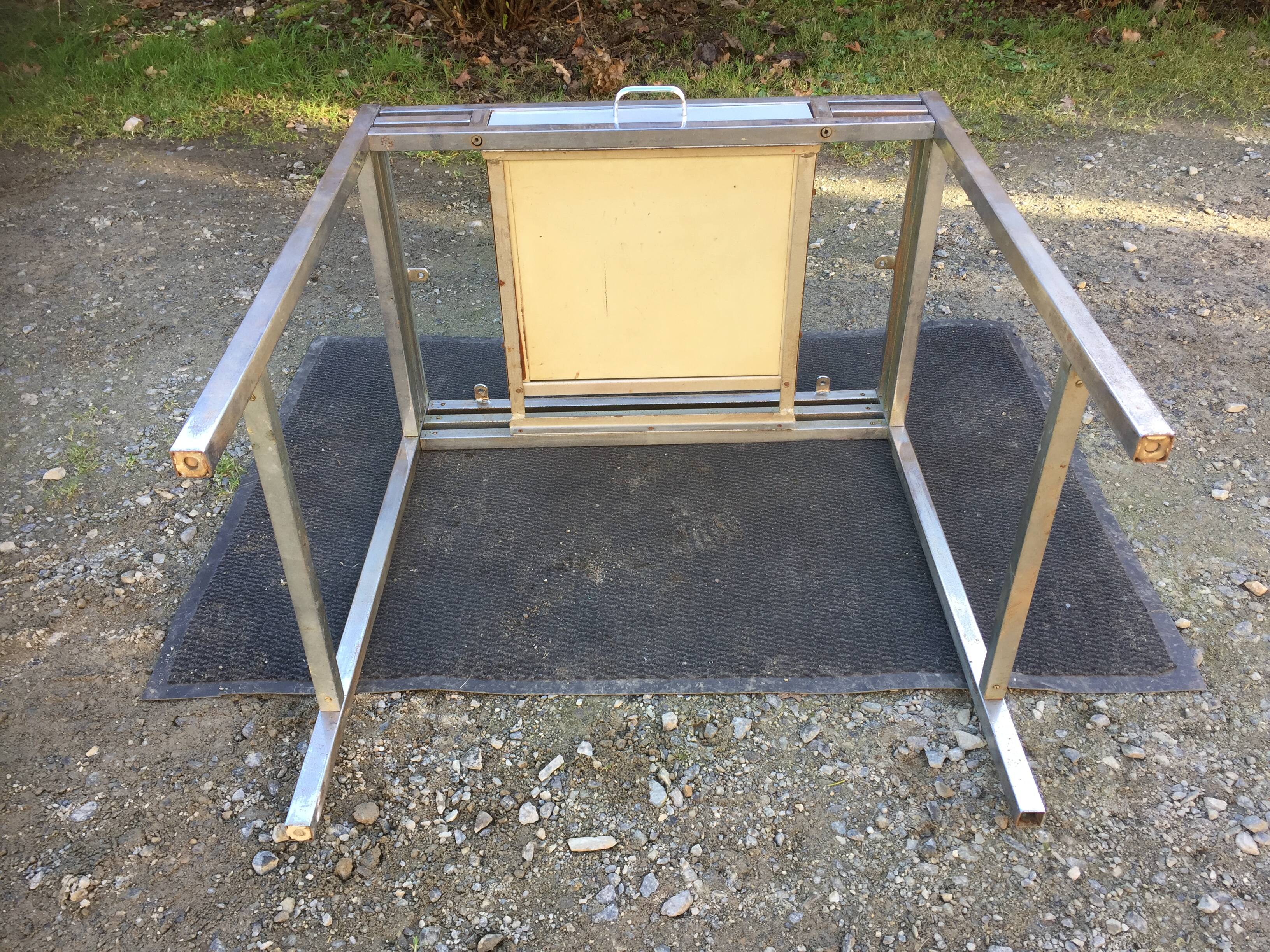 Vintage table with square chrome tubular metal base and marble top.