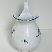 Moustiers pitcher with blue floral decoration