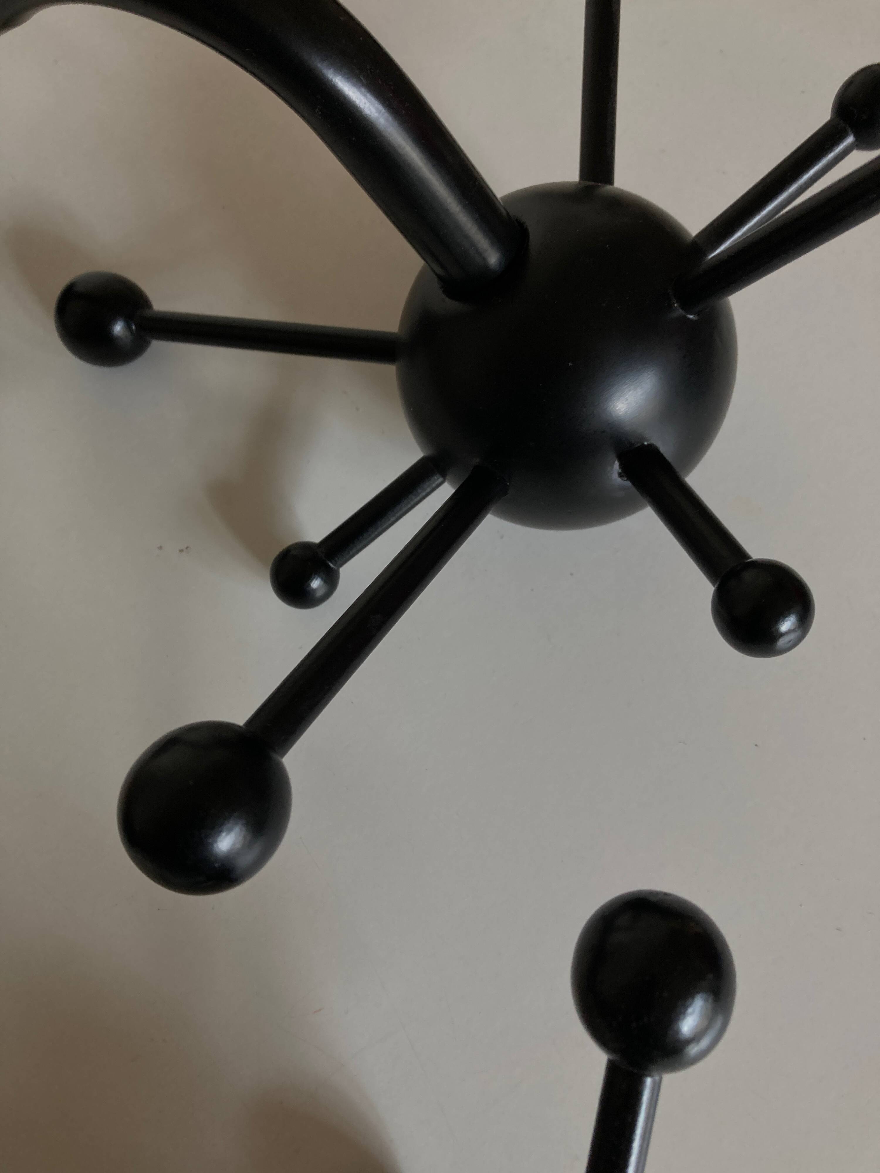 Pair of black space age sputnik coat racks