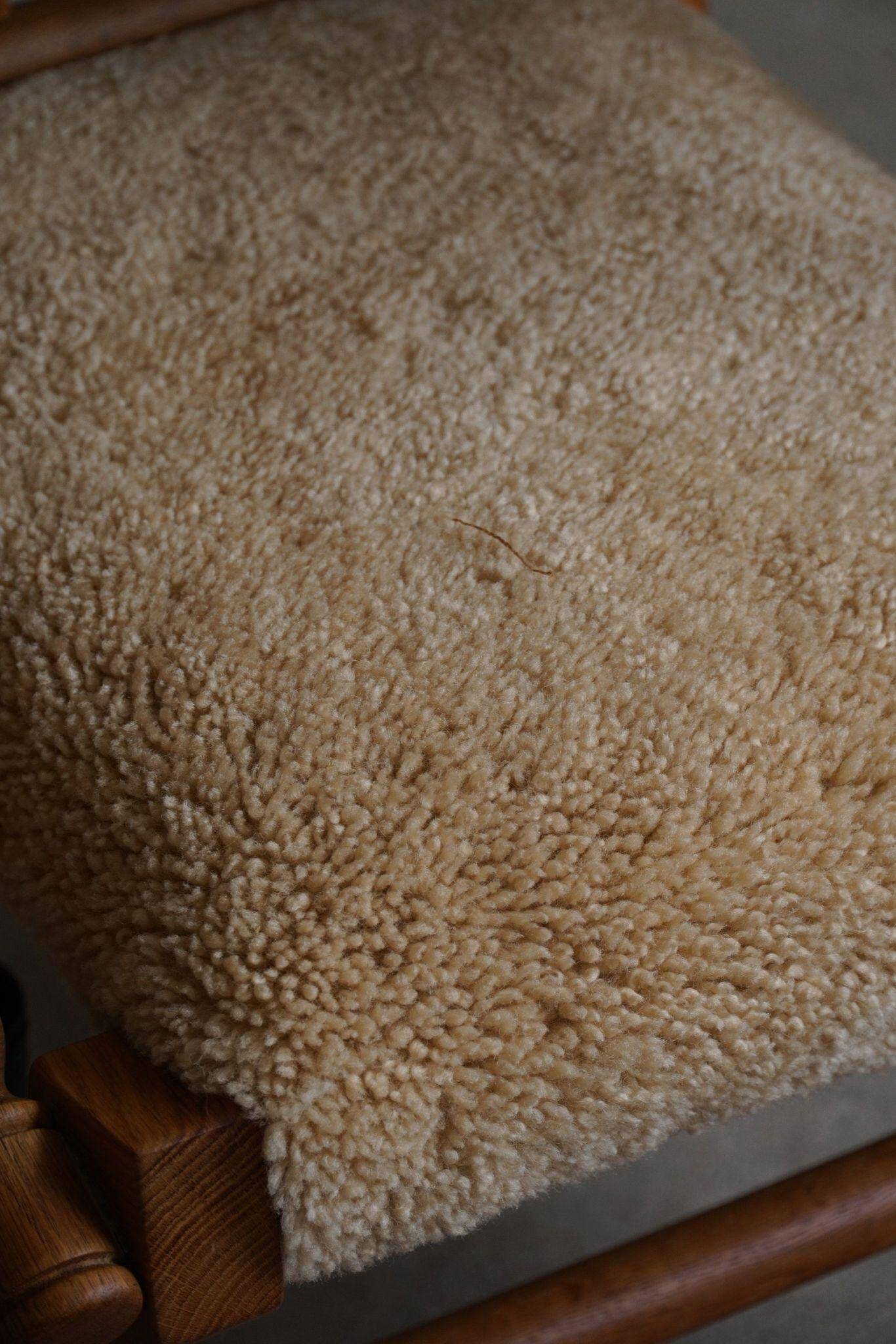 Pair of sculptural Danish modern rocking chairs in lambswool and oak, brutalist, 1950.
