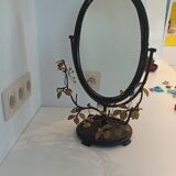 Table mirror, tilting psyche in patinated bronze decorated with leaves and fruits